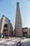 Minaret of madrasah Islom-hoja in a old city Ichan Qala in Khiva Uzbekistan