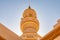 The minaret of a mosque in the desert of Oman