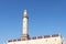 minaret of a mosque from muslim islamic culture, minarets blue sky , historic traditional minaret