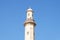 minaret of a mosque from muslim islamic culture, minarets blue sky , historic traditional minaret