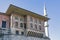 Minaret of the ottoman yeni mosque and historical building view in eminonu district at sun