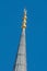 Minaret spire with gold crescent in closeup