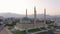 Minarets and domes of Blue Mosque at Turkey. Picturesque urban landscape and mountains.