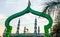 Minarets framed within the Islamic design of an iron gate,Karnataka,India