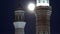 Minarets of The Hazrat Sultan Mosque in Astana timelapse at night with full moon, Kazakhstan