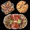 Minced Meat Loaves and Chicken Ties in Glass Baking Pan with Appetizer dish and Leavened Flatbread Isolated on Black Background