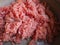 Minced meat in a metal saucepan. Delicious fresh ground meat for making cutlets, steaks, hamburgers, meatballs