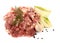 Minced meat, onion, garlic, pepper and herbs on white background.