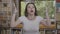 Mind blown reaction of millennial amazed woman feeling overwhelmed and stunned -