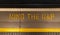 Mind the gap typical sign painted on a tube platform edge. Painted warning on the floor. Mind the gap sign in train station