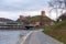 Mindaugas Bridge at Neris River and Vilnius Upper Castle on the hill in Vilnius Old Town, Lithuania