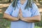 Mindful senior woman close up with dreadlocks meditating on nature - wellness and yoga practice
