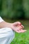 Mindfulness in detailed meditation moment. Focus in this close-up of a woman\'s hand