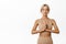 Mindfulness. Fitness girl with fit body, feeling focused, doing yoga workout, practice meditation, standing in