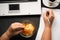 Mindless snacking, junk food. Woman eating chips