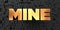 Mine - Gold text on black background - 3D rendered royalty free stock picture