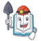 Miner opened book in the shape mascot