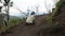 Miner pulls a cart from the top of active Kawah Ijen volcano with a load of mined sulfur