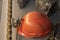Miner`s helmet with iron and rocks