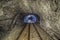 Miner in the underground mine with light in mine Stebnyk, Ukraine