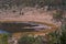 MINERAL ENCRUSTED PERIMETER OF A METEOR CRATER SALT LAKE