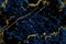 mineral gold line on dark blue marble surface of cave for interior wallpaper