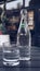 Mineral water in a glass on the table,a glass bottle with ordinary natural water.
