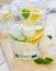 Mineral water with limes, oranges, lemons, ice and mint