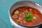 Minestrone Soup served in a clay bowl