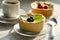 Mini berry tarts with a cup of coffee