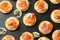 Mini blini pancakes with soft cheese, cold smoked salmon and dill