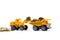 Mini bulldozer truck loading stack coin with pile of gold coin,