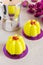 Mini cakes with yellow glaze