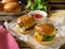 Mini cheeseburgers sliders with ground beef, cheddar, lettuce an