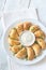 Mini chicken pies with creamy garlic sauce