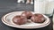 Mini chocolate donuts vanishing from a plate