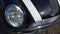 Mini cooper car headlight and logo front hood model produced by BMW German luxury