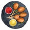 Mini corn dogs on a black board with sauces