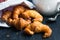 Mini croissants in a paper bag