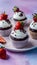 Mini cupcakes topped with chocolate and strawberries, complimentary download