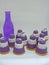 Mini cupcakes in white and violet colors isolated