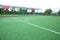 Mini Football Goal On An Artificial Grass . Inside of indoor football field . Mini football stadium center