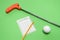 Mini Golf club with score card, ball and pencil