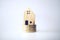 Mini house model on gold coin with clean white copyspace background. Business invest property saving