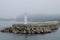 Mini Lighthouse on the coast. small lighthouse on the pier in South Korea