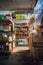 Mini market indoor in a small town. The shelves display a variety of daily goods