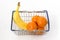 Mini metal shopping basket with banana and clementines
