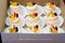 Mini pavlovas with whipped cream, fresh fruit and cream puff