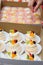 Mini pavlovas with whipped cream, fresh fruit and cream puff