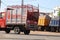 A mini pickup truck carrying household cooking gas cylinders for Liquified Petroleum Gas.